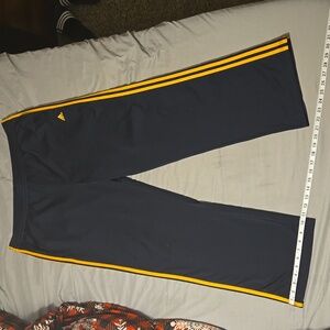 Adidas navy blue with gold  3 stripe joggers